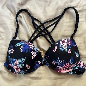 Bathing suit top- black with blue/pink floral design. Size small. 34B would fit